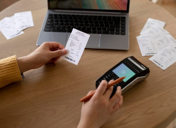 Business professional working on digital invoices on a laptop in UAE